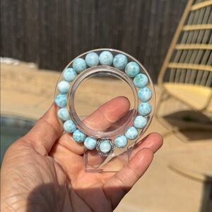 Genuine Larimar 10mm beads with pendant 6.5 wrist size. Can customize size
